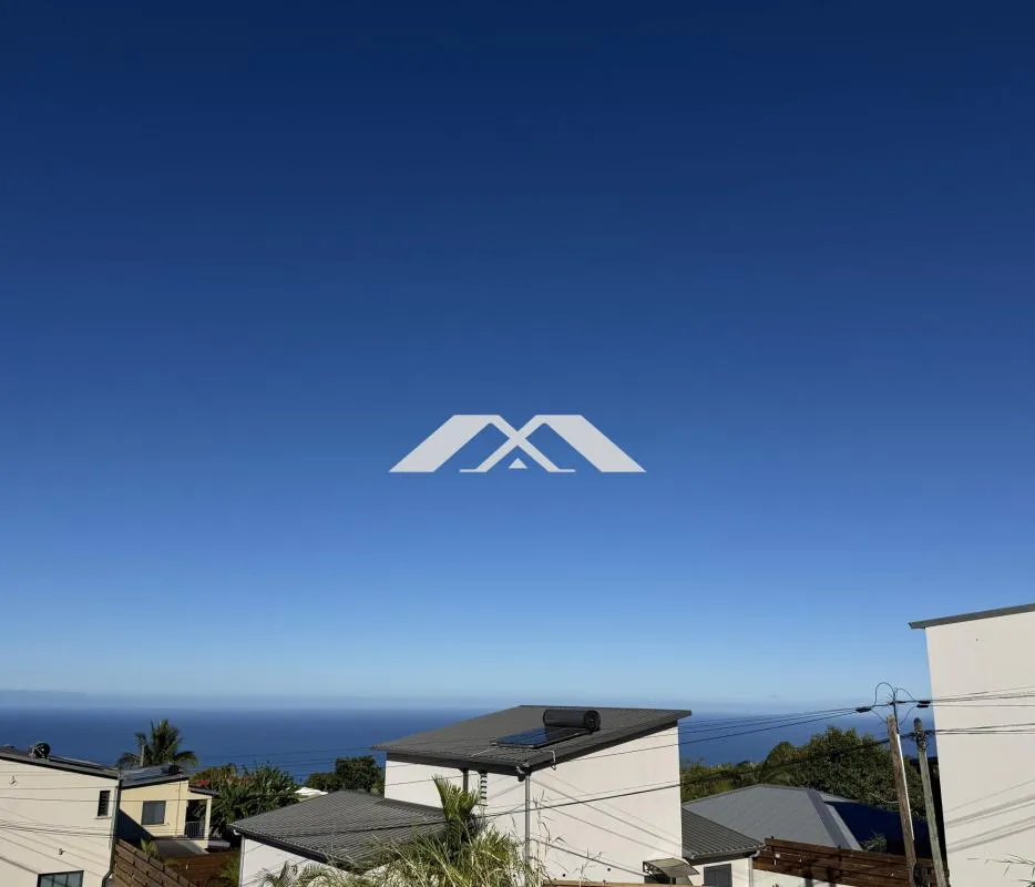 Terrain d'exception avec vue mer aux Avirons