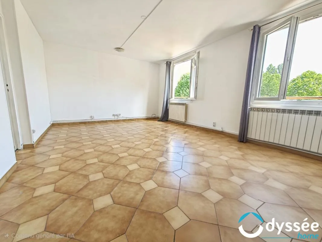 À vendre - Appartement T4 traversant de 73,97 m² avec cave e