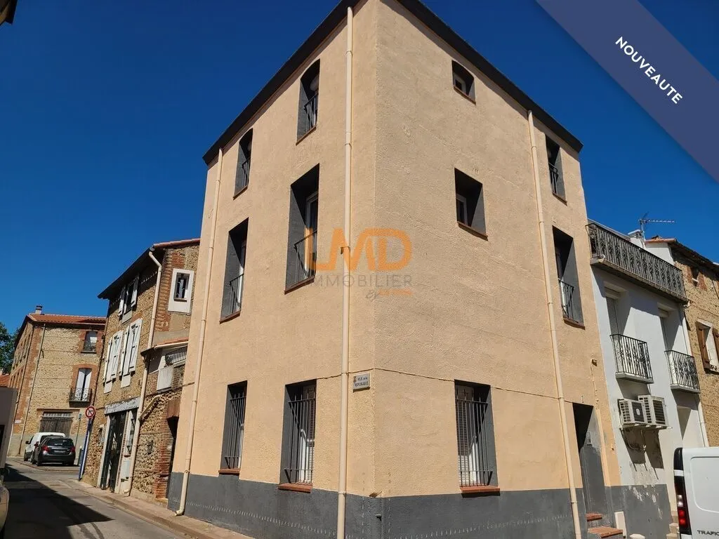 immeuble d'habitation sur 3 niveaux