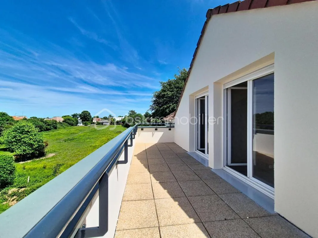 Bel appartement F3 avec terrasse et parking privatif