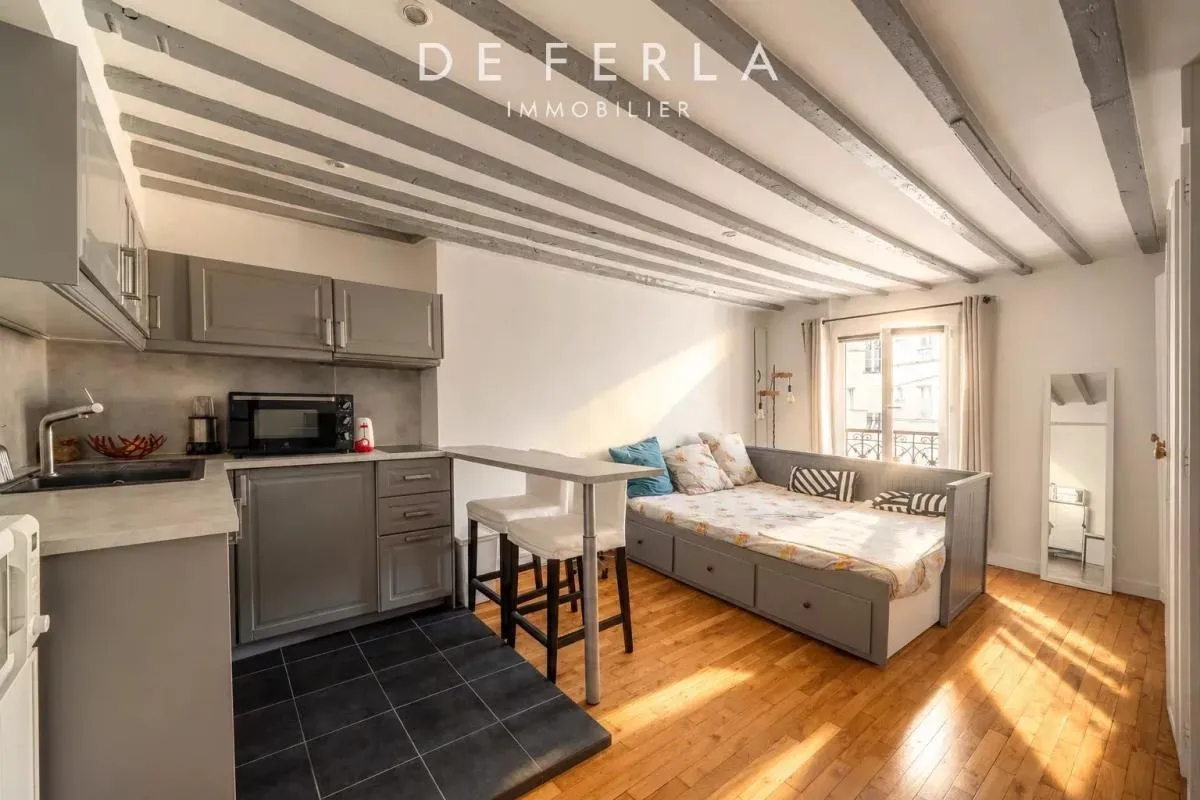 Studio en étage élévé avec ascenseur avec vue dégagée - Vème
