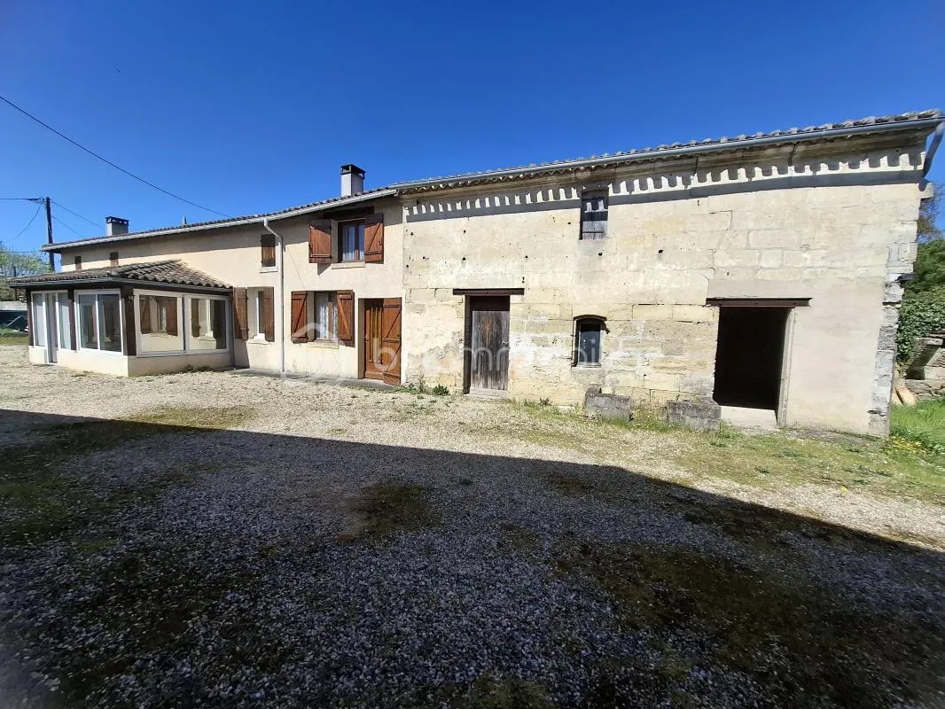 Maison en pierre avec dépendances sur SABLONS (33 910)