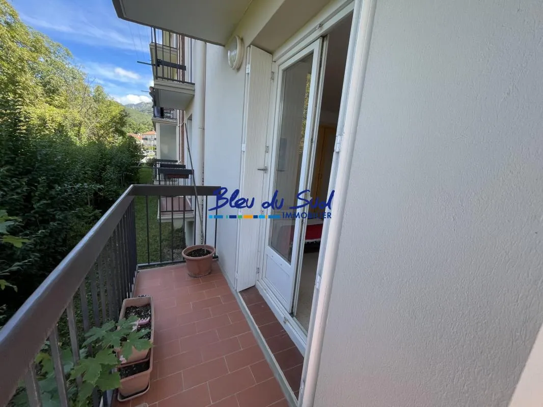 Appartement loué avec place de parking couverte et cave