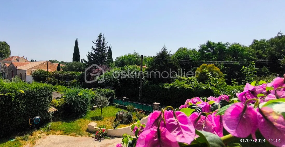 Belle maison divisée en 2 appartements ( T4 /110m2 et  T3/ 46 m2)  avec garage de 48m2