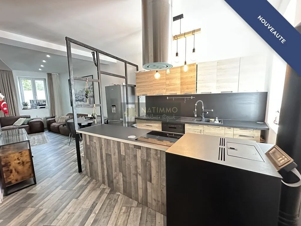 Appartement en triplex avec garage
