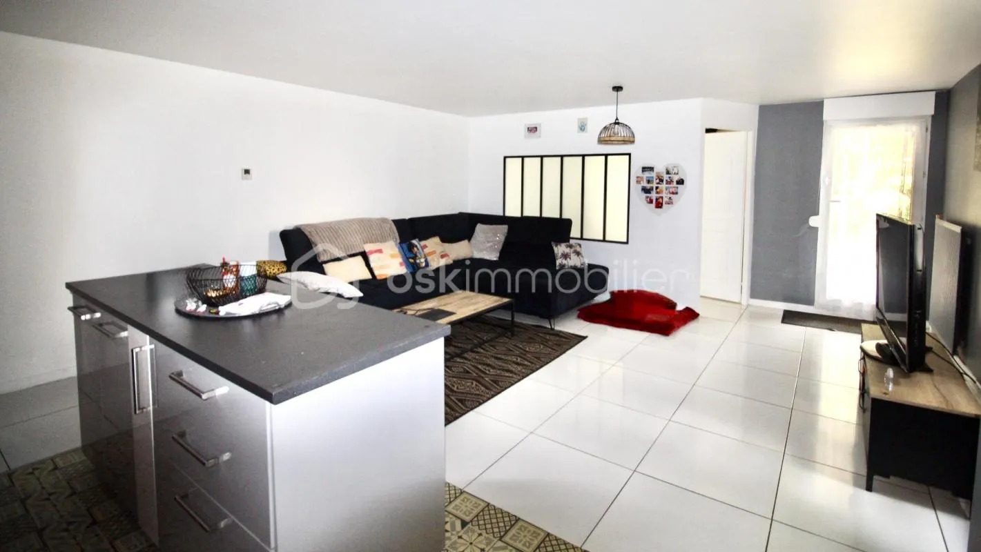 Appartement de 77 m2 avec jardin privatif de 400 m² et Box