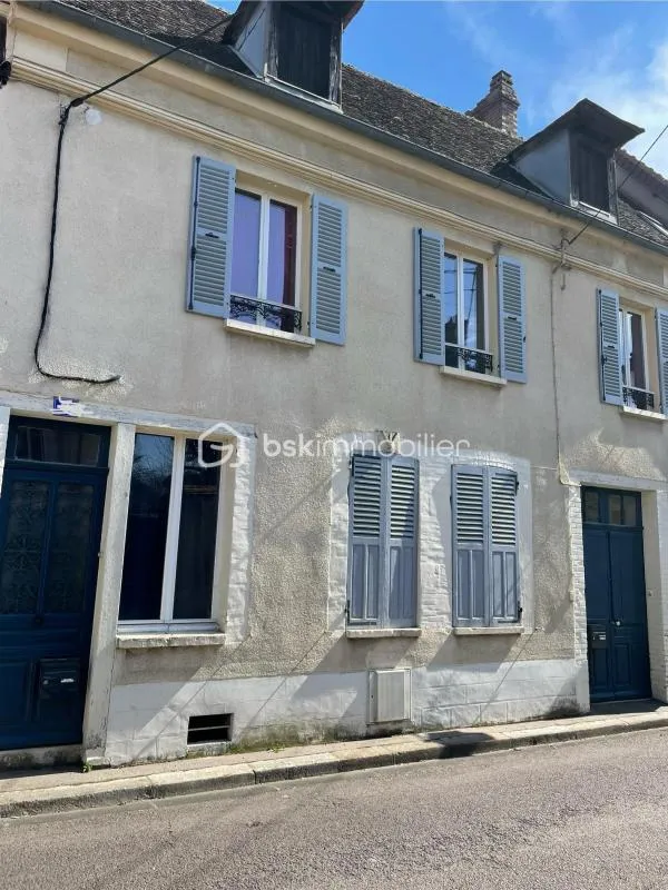 Maison de ville avec appartements et jardin