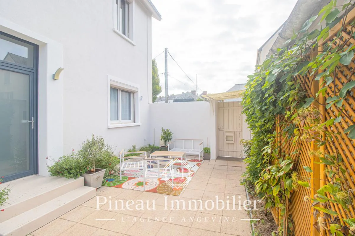 Maison de ville - 5 pièces - 3 chambres - 87m2 habitable - 170m2 terrain - Jardin/Terrasse - Garage