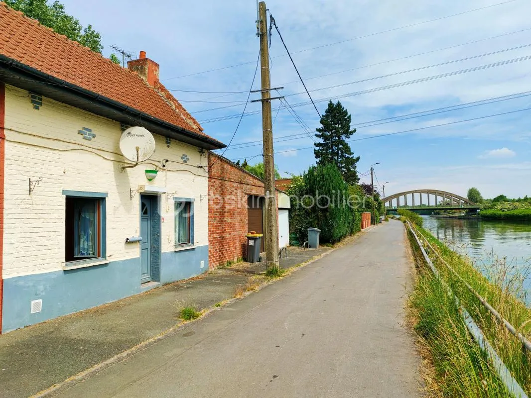 Charmante petite maison 1930 située en bordure du canal de la Deule