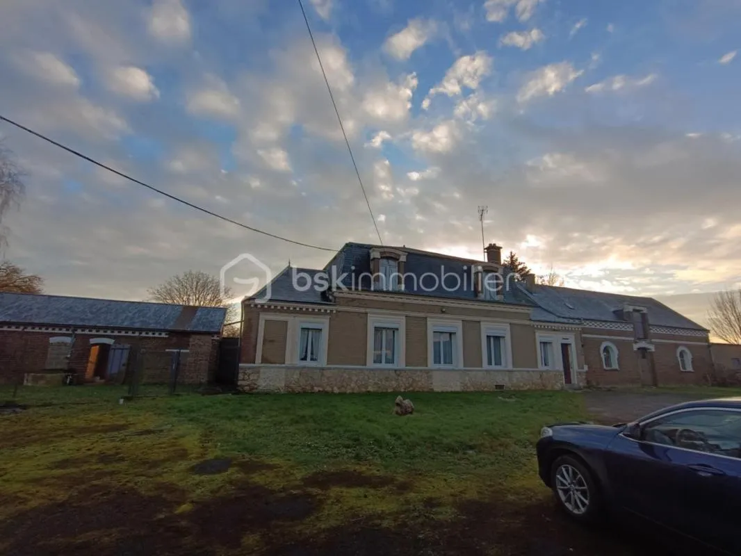 Corps de ferme de 514 m² avec granges