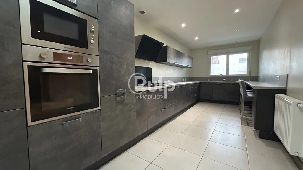 Maison semi-individuelle avec jardin et garage sur Méricourt