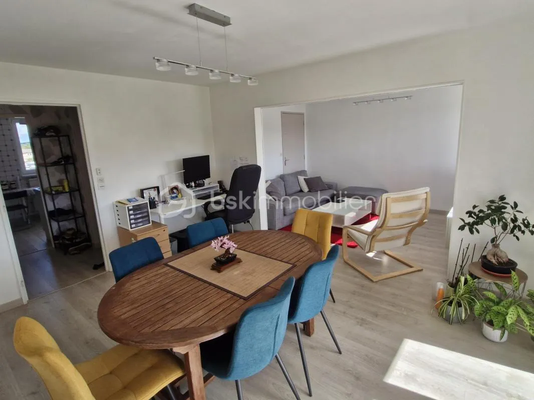 Appartement F3 80m² avec balcon et cave