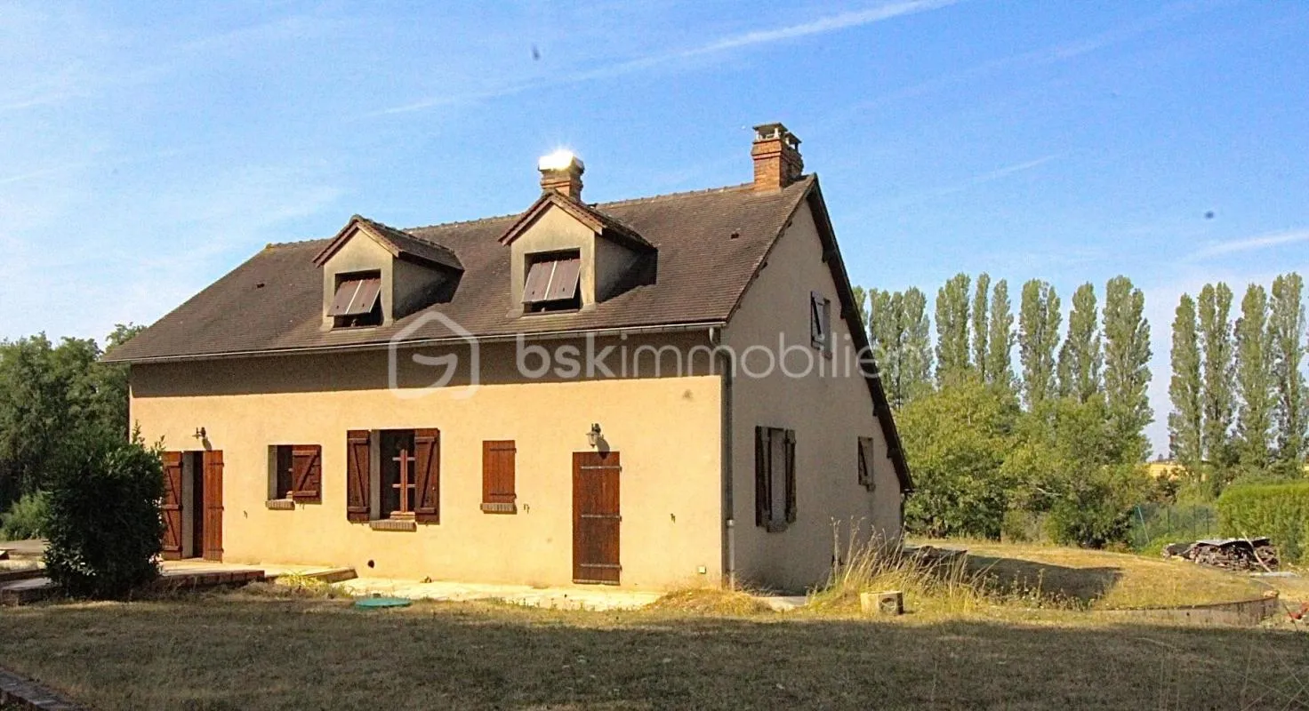 Maison familiale d'exception avec étang privé et grand terrain arboré