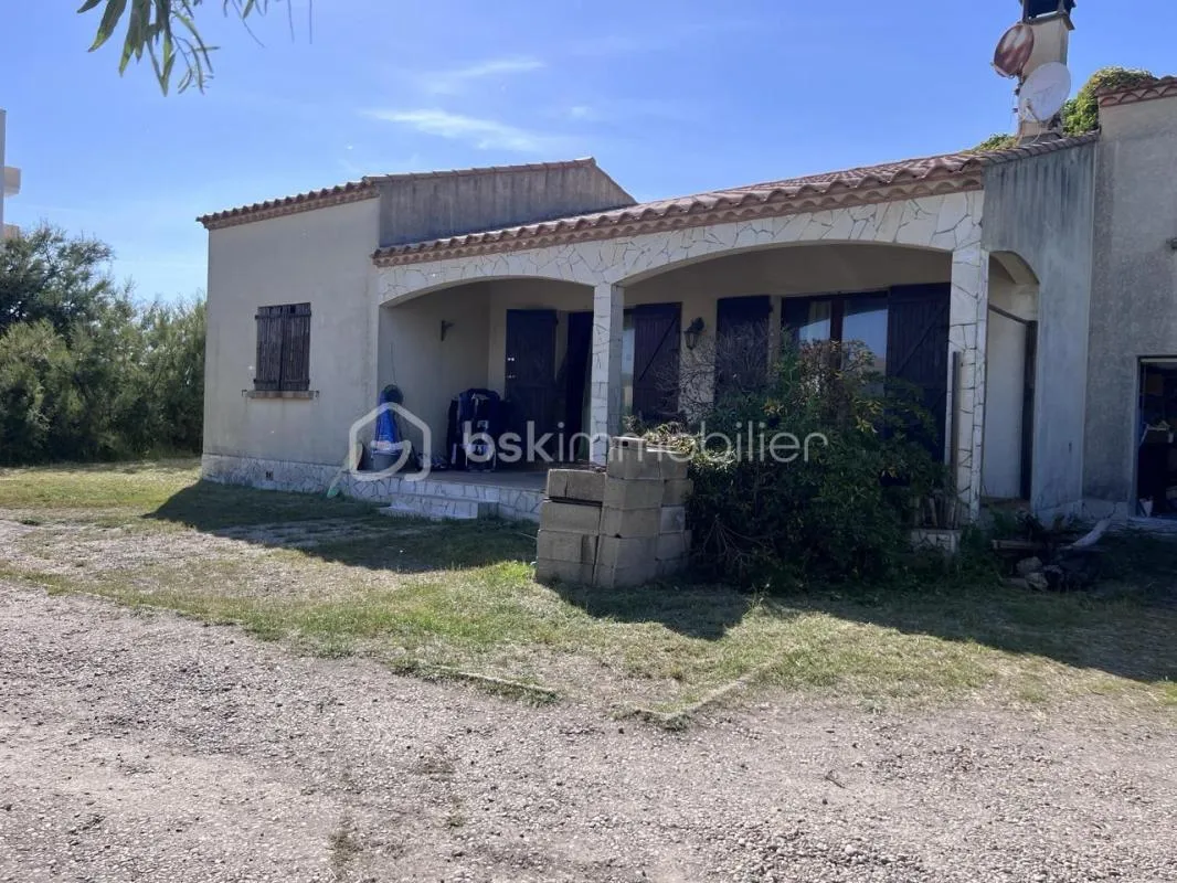 villa de plain pied à rénover de 65,51 m2 avec terrasse couverte de 16 m2 sur 489 m2 de terrain