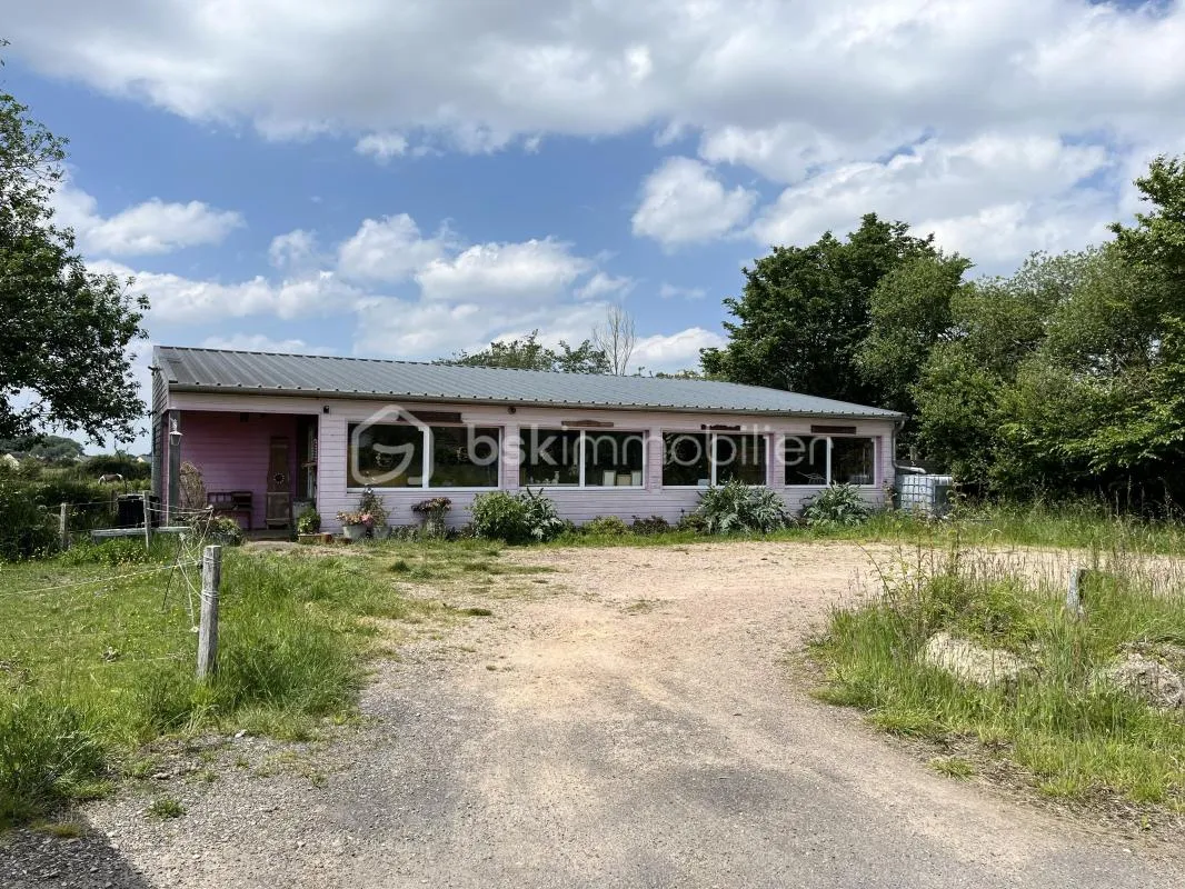 Local (possibilité habitation) avec station de lavage auto et terrain
