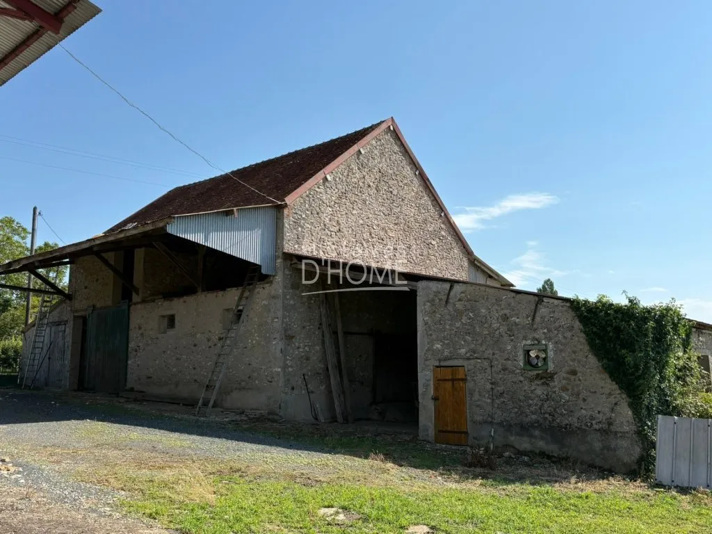Terrain de 2,39 hectares avec bâtiment