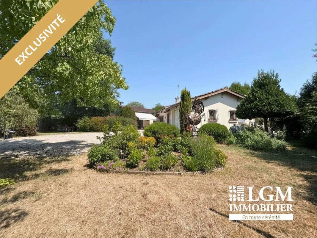 Maison familiale 155 m² – 4 chambres, terrain arboré et double accès proche du centre-ville