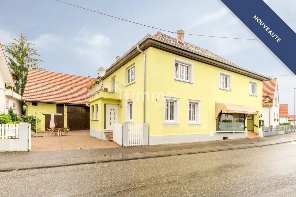 Immeuble mixte 400m² + dépendances sur 20 ares