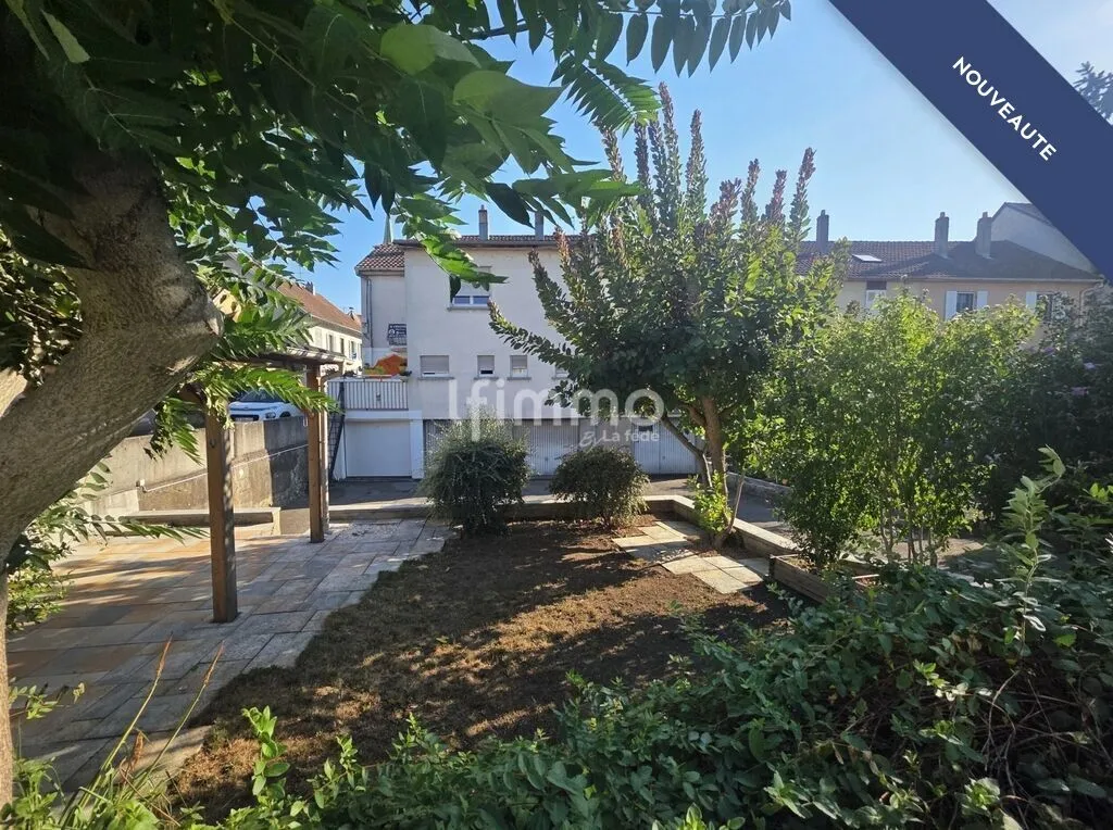 Duplex atypique de 158 m² avec jardin et 2 garages
