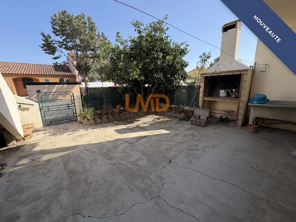 Maison de ville 100 m2 T4 avec cour et garage